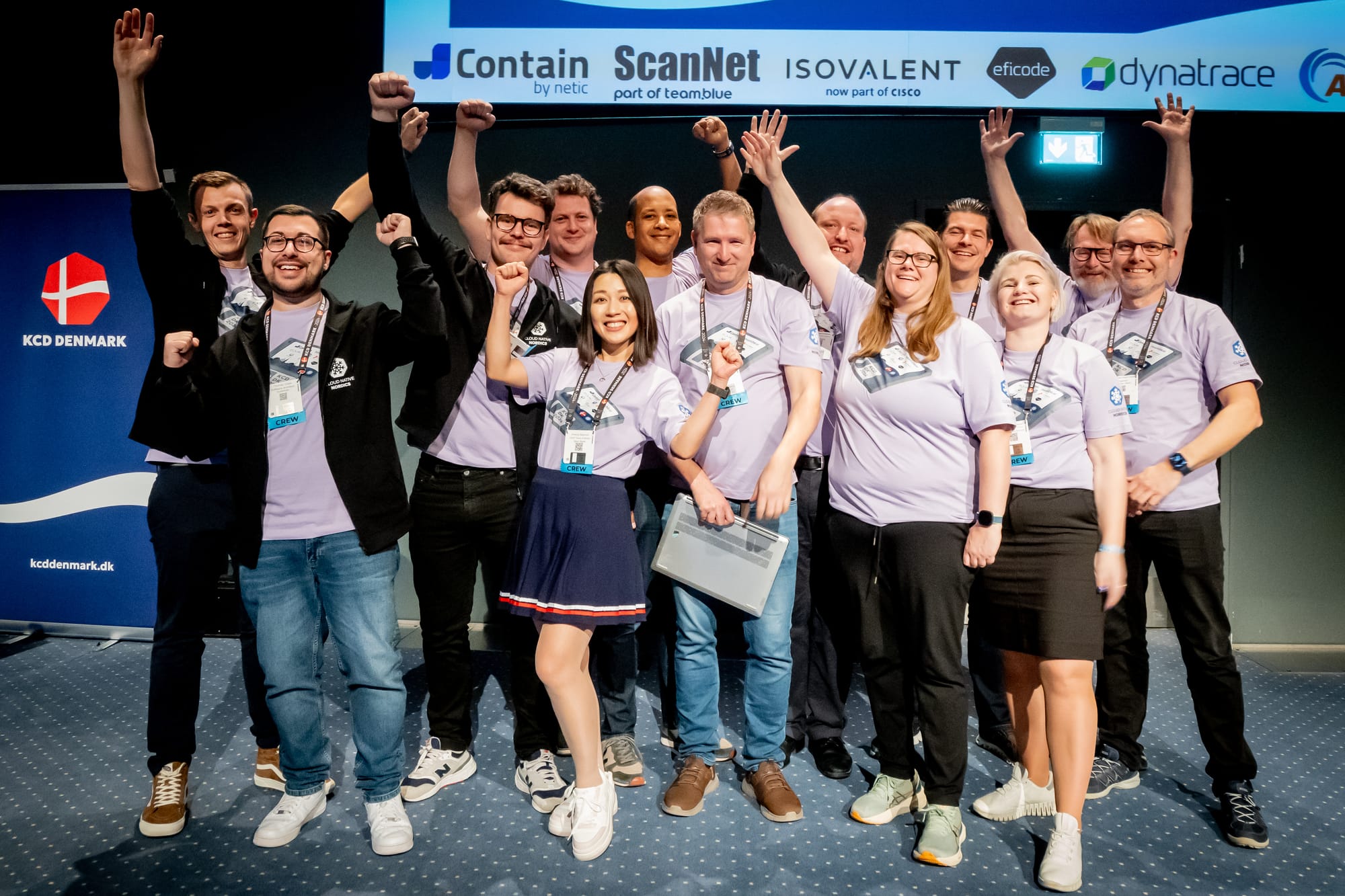 The organizers of KCD Denmark 2024, celebrating on stage at the end of the conference.