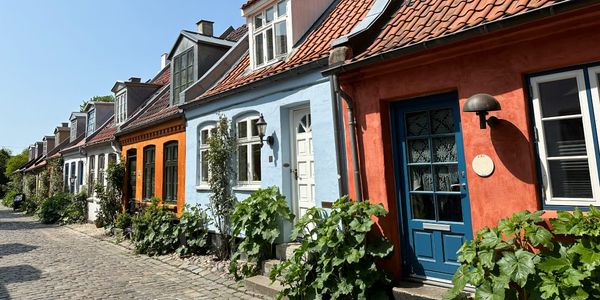 Colourful houses in a row, in a sunny day in Denmark.